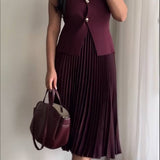 Knitted Vest And Pleated Skirt