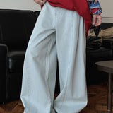 Deconstructed Flared Denim Jeans