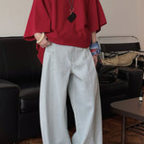 Deconstructed Flared Denim Jeans