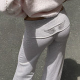 Solid Wing Sequin Embroidered Casual Pants