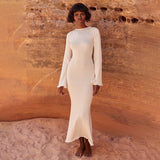 Solid knitted open back flared long sleeve maxi dress
