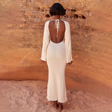 Solid knitted open back flared long sleeve maxi dress