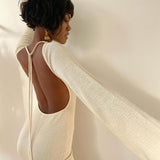 Solid knitted open back flared long sleeve maxi dress