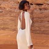 Solid knitted open back flared long sleeve maxi dress