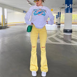 Women Stretch Yellow Ripped Hips Strap Bell Bottom Trouser